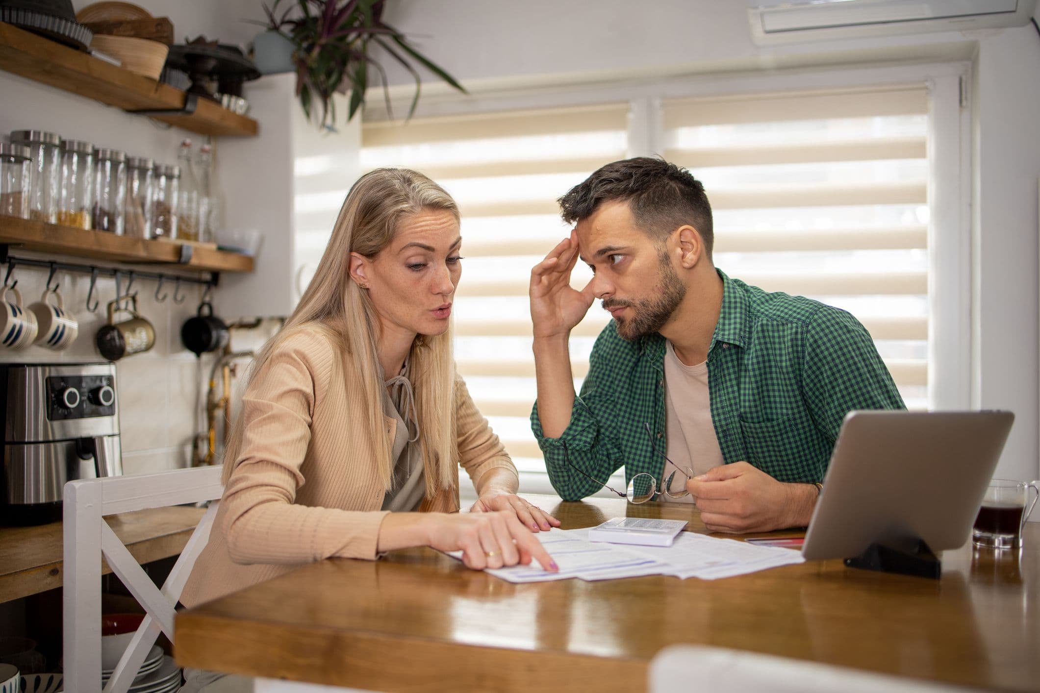 Couple reading an article about What is a credit check