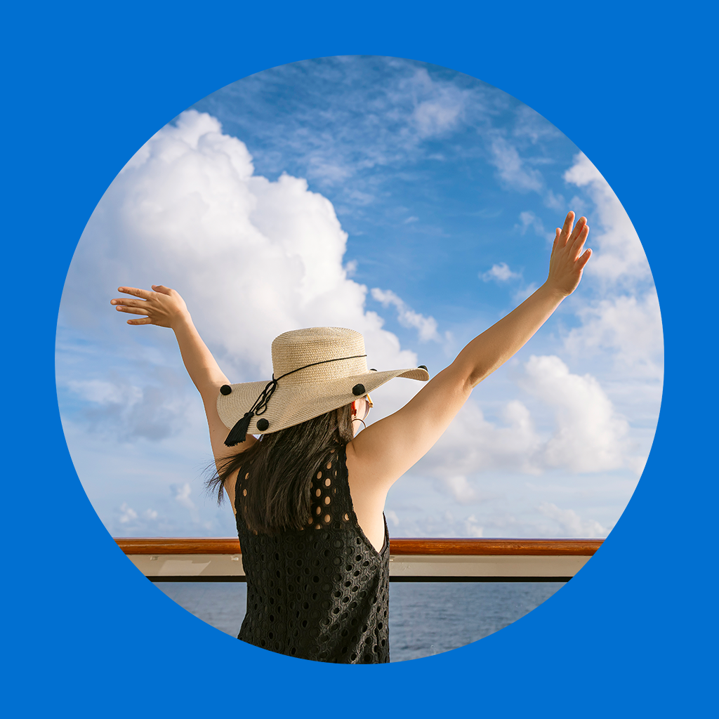 Person standing on a boat with arms raised, symbolizing freedom and opportunity in career growth