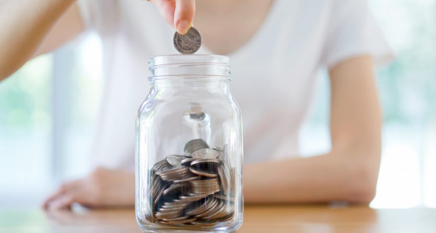 Putting money in Coin Jar