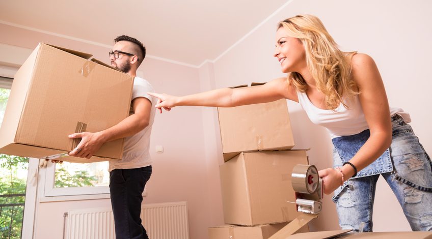 Couple Moving boxes home