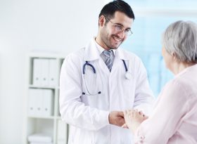 Doctor giving assurance to patient