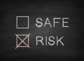 Risk and Safe check boxes on chalk board