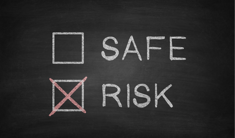 Risk and Safe check boxes on chalk board