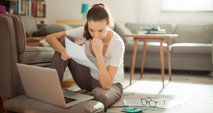 Young woman on her computer at home