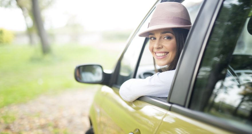 Woman looking out from the car window