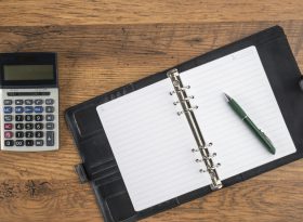 Organiser and calculator on table