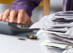 Piled up receipts on table