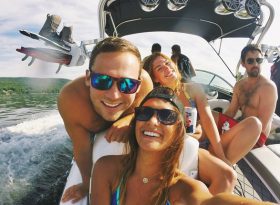 A group of friends on a speed boat