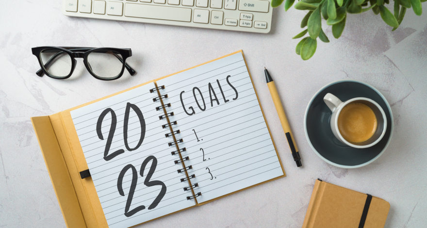 New Year 2023 goals and resolution business concept with noteboo | Credit24 2023 goal setting on organizer